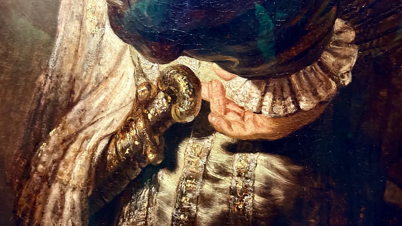 Gold sleeve painted in a thick layer, detail from Rembrandt's The Jewish Bride